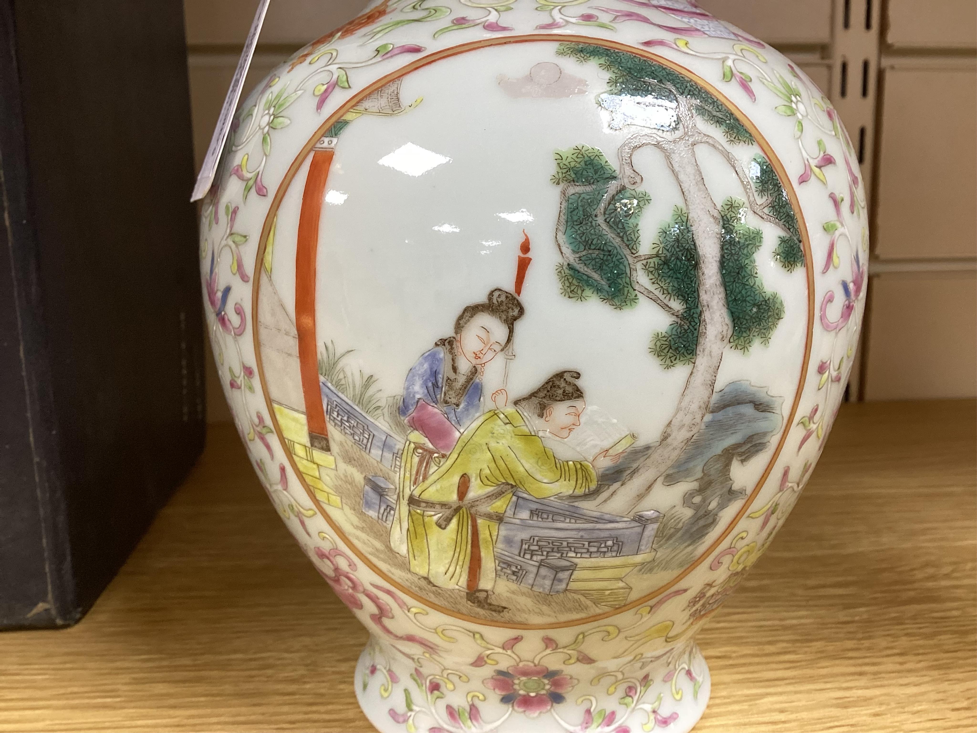 A Chinese famille rose vase, a powder box and an enamelled vase, largest 21cm high